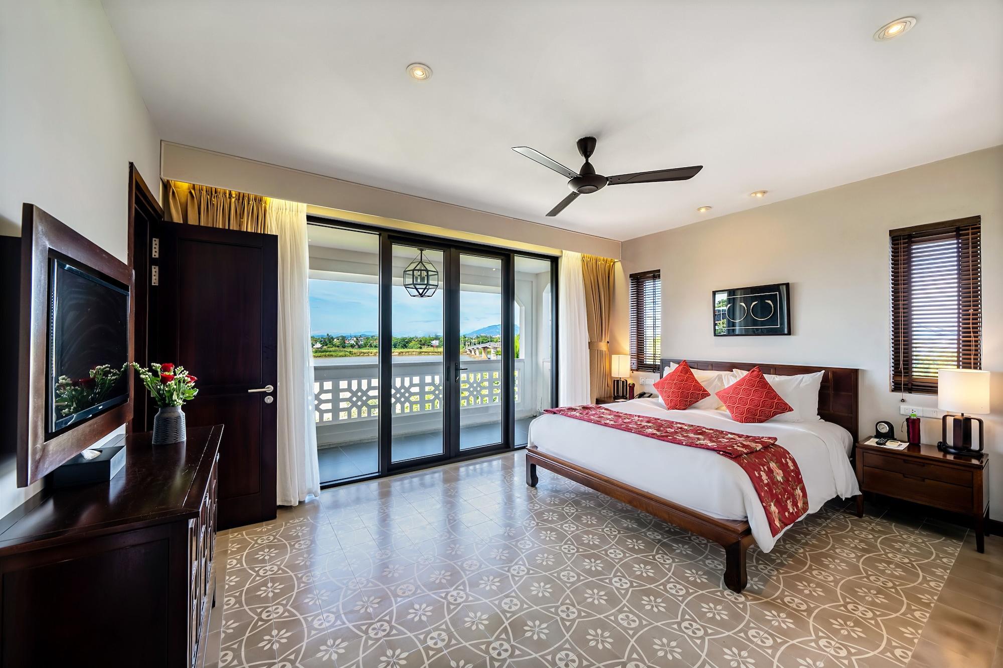 Rivertown Hoi An Resort & Spa Exterior foto A bedroom at the resort