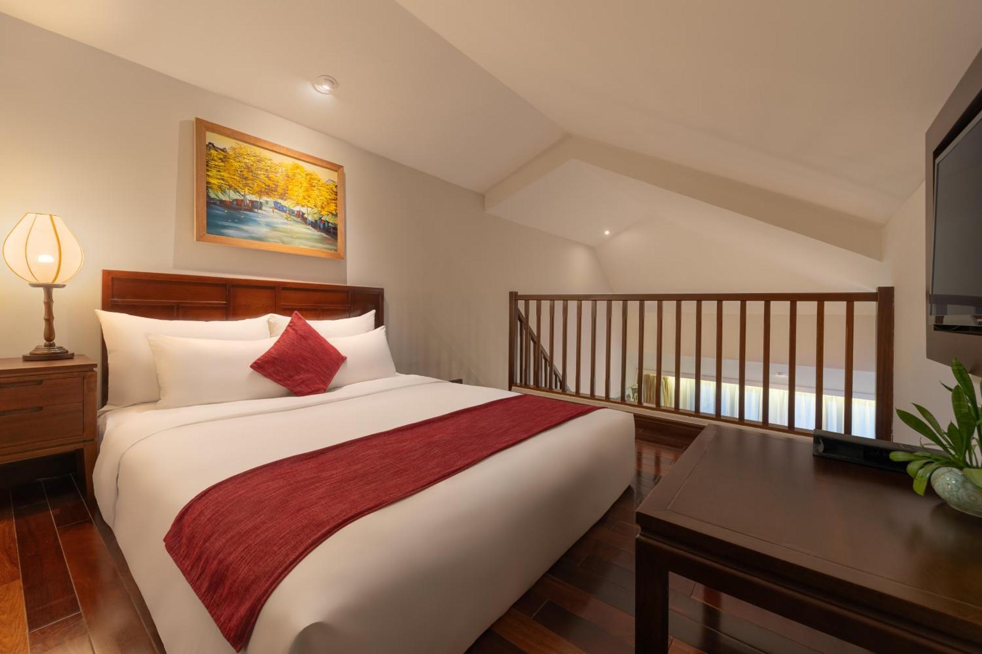 Rivertown Hoi An Resort & Spa Exterior foto A bedroom at the hotel